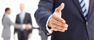 Man with hand extended for a handshake